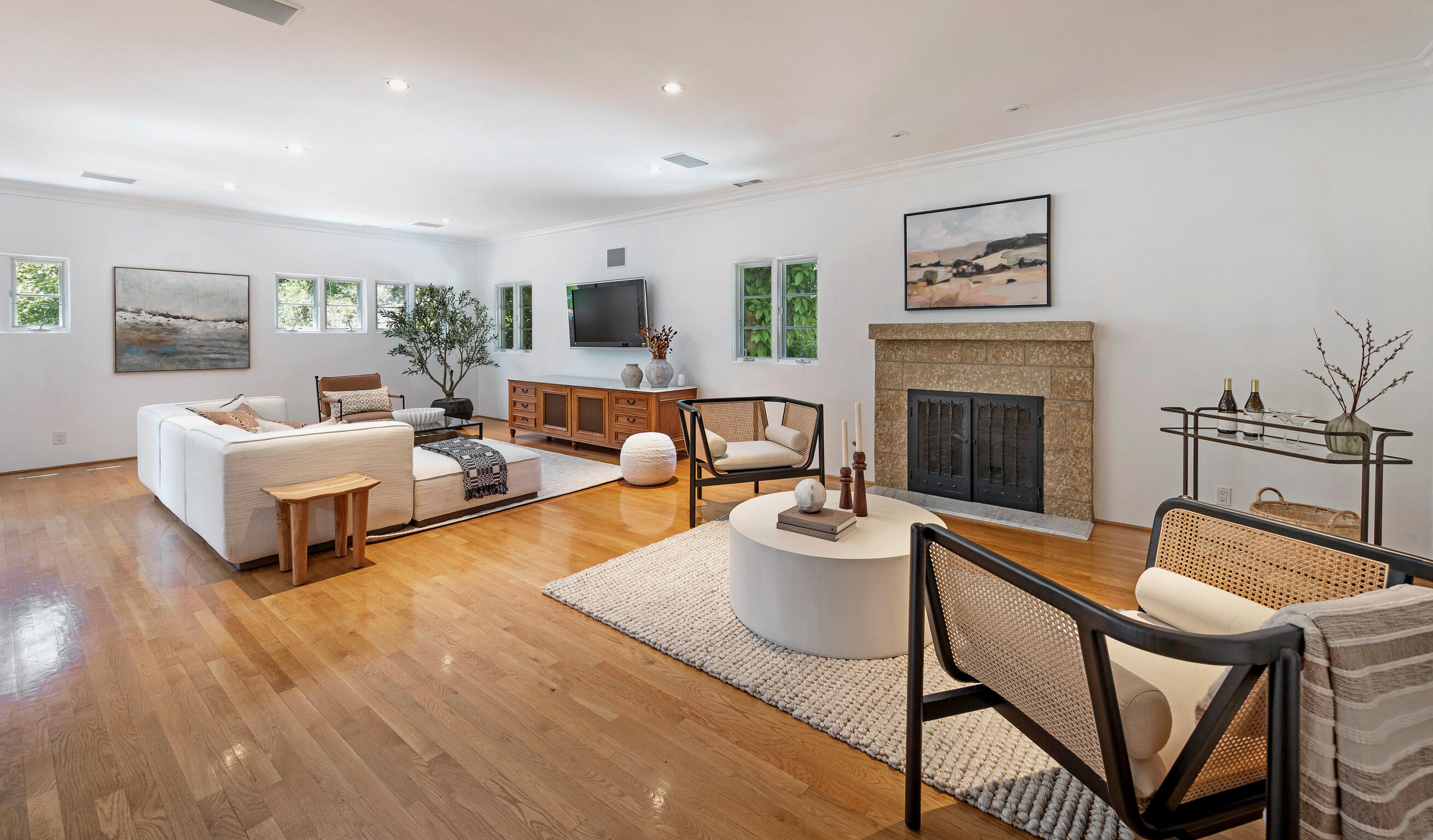 1493 Sycamore Canyon Road Montecito, CA 93108 - Photo 24 of 47 a living room with furniture and a fireplace