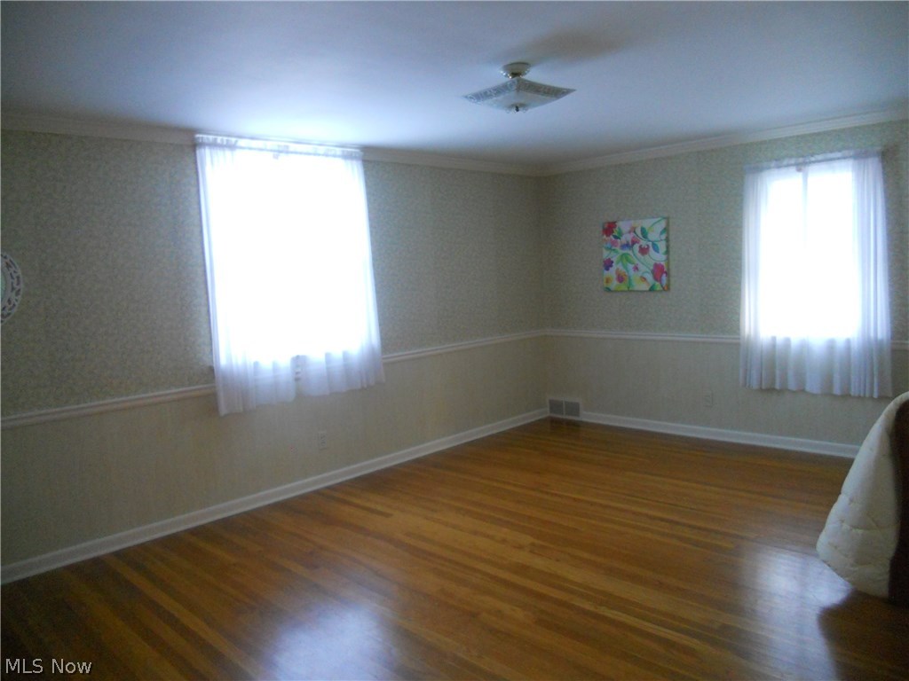 1240 Brainard Road Lyndhurst, OH 44124 - Photo 6 of 12 A darling oversized second level bedroom offers great light, hardwood floors and two large closets.