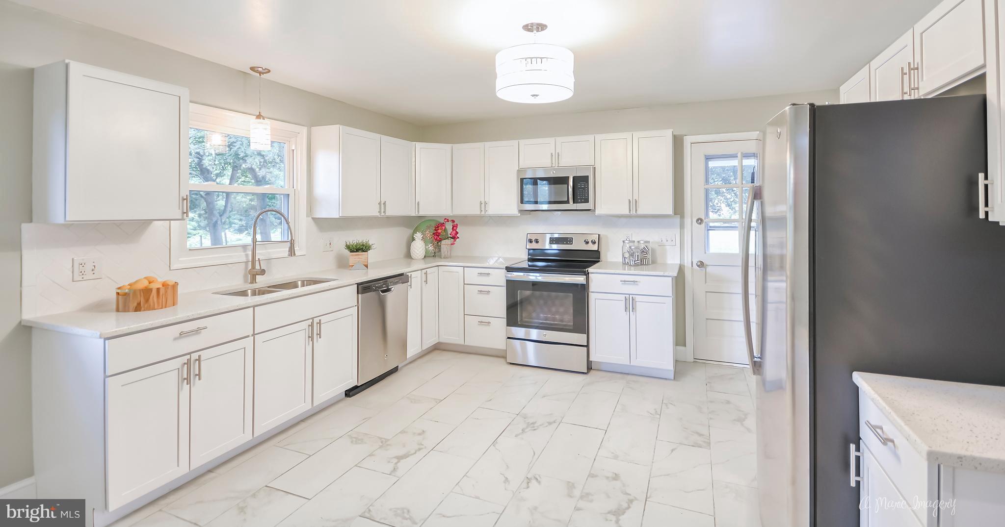 4833 Mt Zion Road Frederick, MD 21703 - Photo 11 of 30 New Cabinets, Fixtures, Flooring, and Appliances
