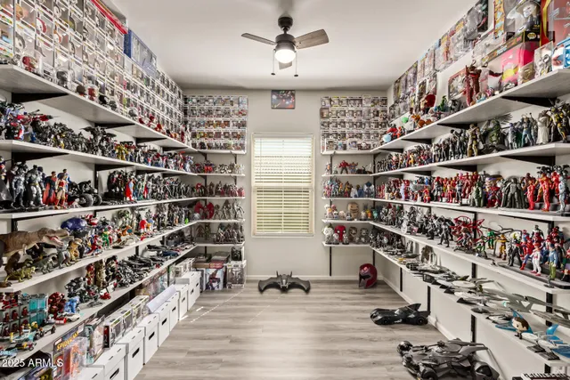 a view of a room with lots of shelves