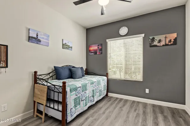 a bedroom with a bed and a view of bathroom