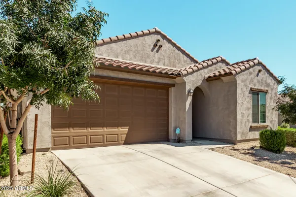 a view of a house with basketball court