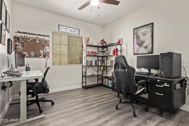 a utility room with fridge and washer