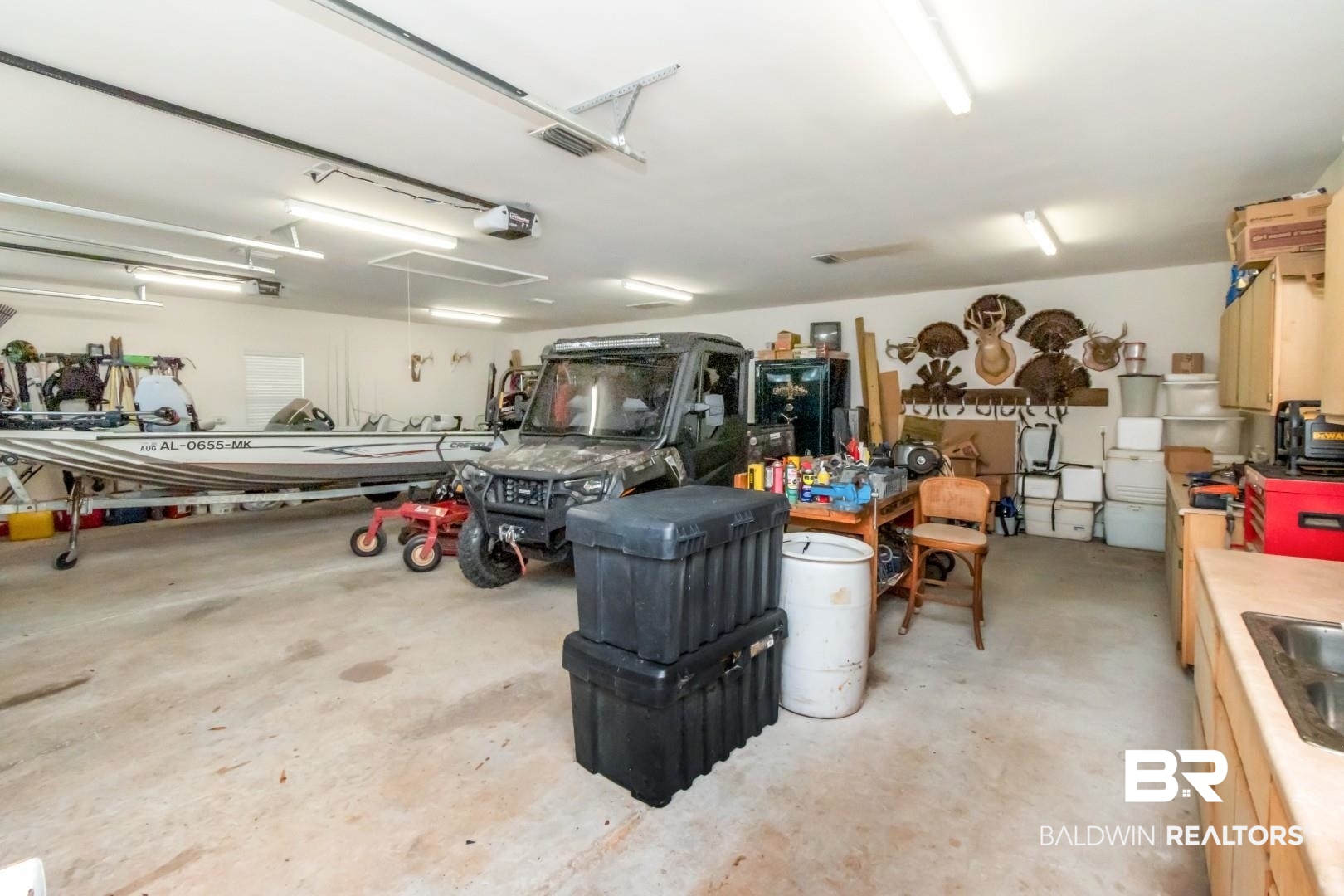 1360 Dykes Road North Mobile, AL 36608 - Photo 28 of 40 Garage with a sink and a garage door opener