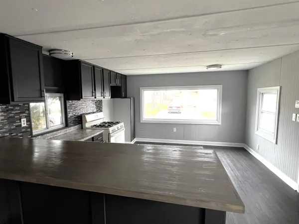 a view of a living room and dining room