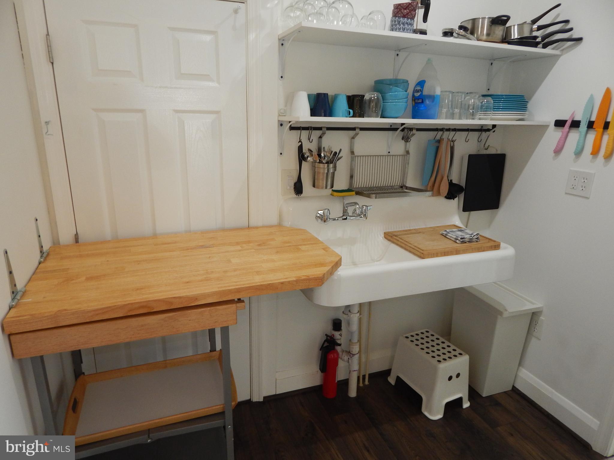 1002 Fawn Street Baltimore, MD 21202 - Photo 11 of 27 a room with storage and utility