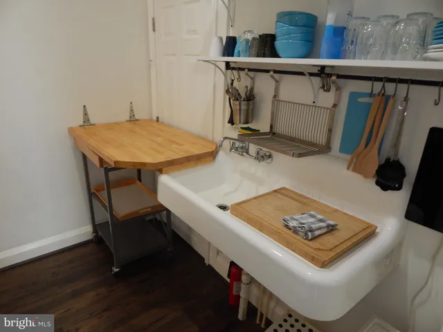 a view of table and chair in wooden floor