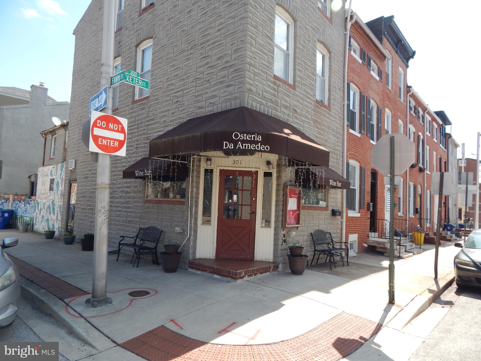 1002 Fawn Street Baltimore, MD 21202 - Photo 24 of 27 a view of a building with retail shops