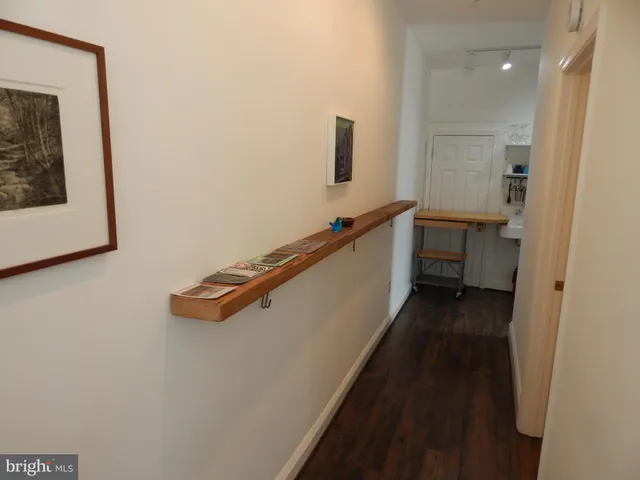 a bathroom with a bathtub and a sink