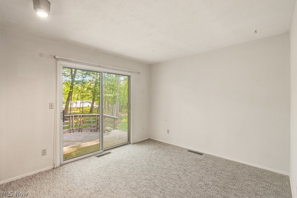 17482 Falling Water Road Strongsville, OH 44136 - Photo 21 of 33 Bedroom 2 with deck access