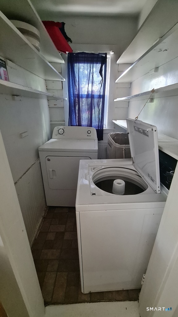64-66 Ridge Street Manchester, CT 06040 - Photo 20 of 21 a utility room with dryer and washer