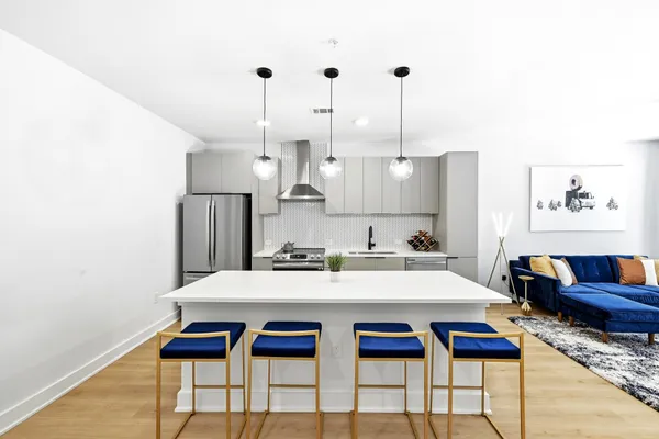 a view of dining table and chairs