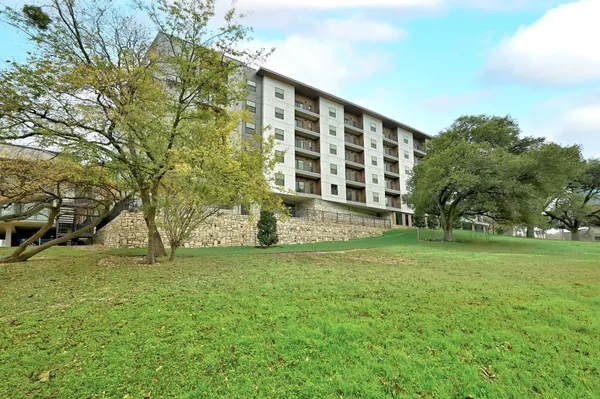 a front view of a building with street view