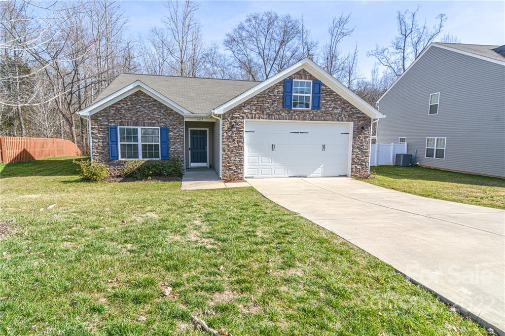 1617 Beleek Ridge Lane Clover, SC 29710 - Photo 1 of 22 a front view of a house with garden