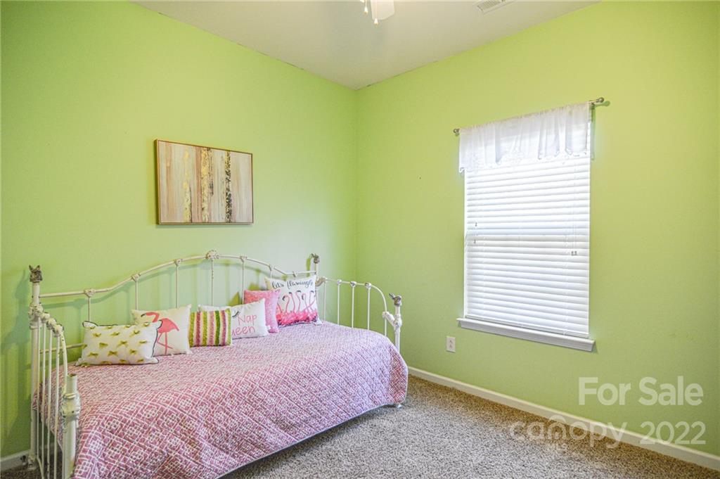 1617 Beleek Ridge Lane Clover, SC 29710 - Photo 12 of 22 a bedroom with a bed and a window
