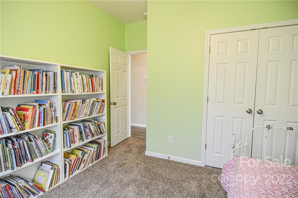 1617 Beleek Ridge Lane Clover, SC 29710 - Photo 13 of 22 a living room with lots of books