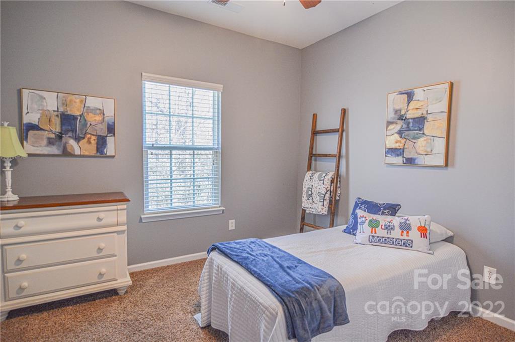 1617 Beleek Ridge Lane Clover, SC 29710 - Photo 14 of 22 a bedroom with a bed and a window