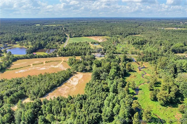 a view of a yard with an outdoor space