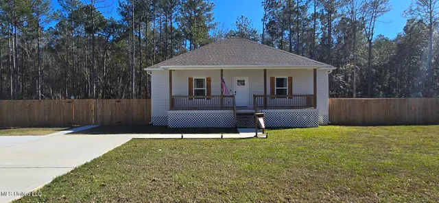$265,000 | 1715 East Lakeshore Drive, Carriere, MS 39426
