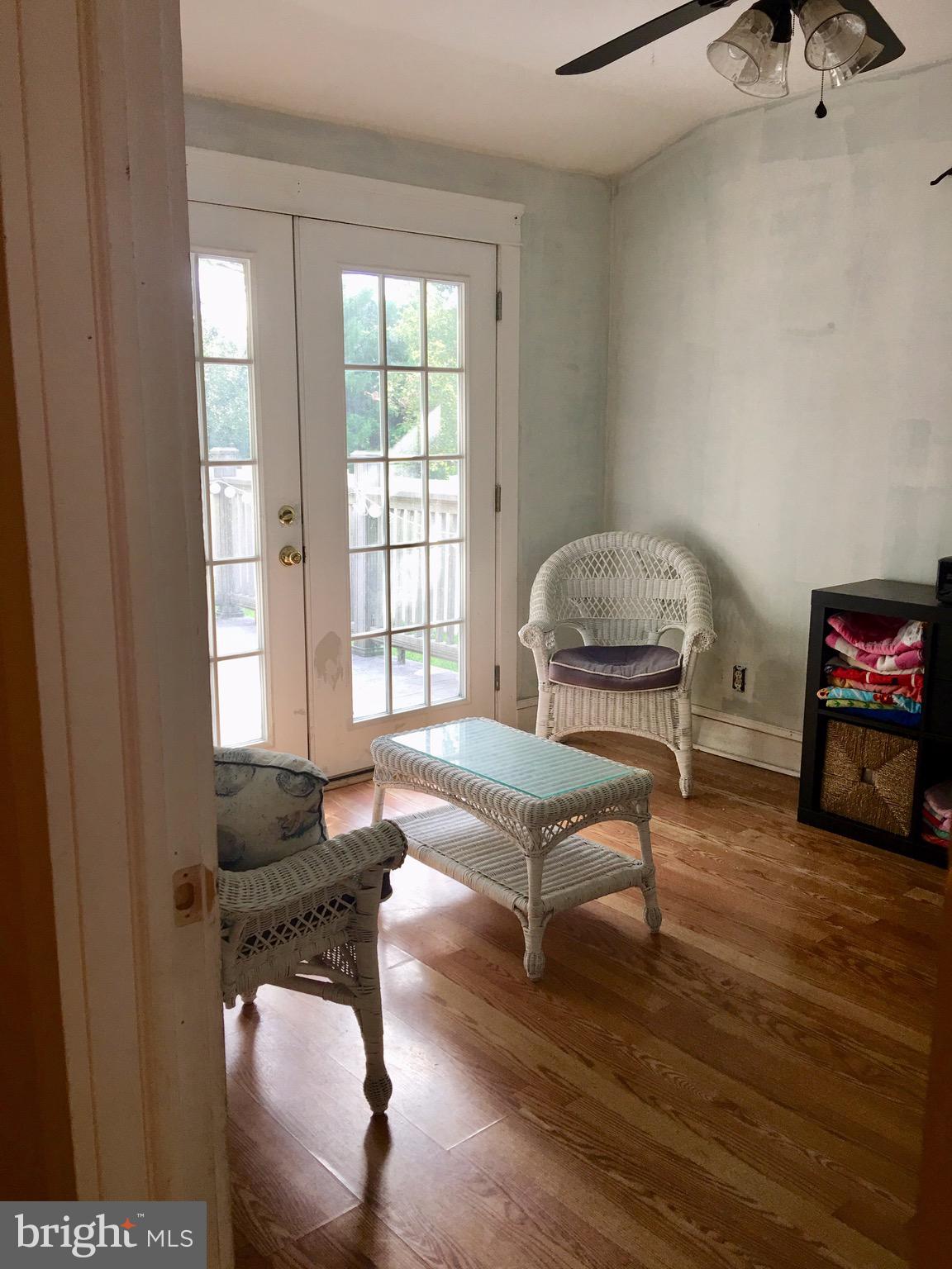 1236 Cushmore Road Southampton, PA 18966 - Photo 10 of 23 Sun room with wood floors and french doors to deck