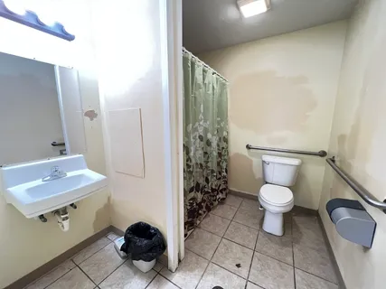 a bathroom with a sink and a shower
