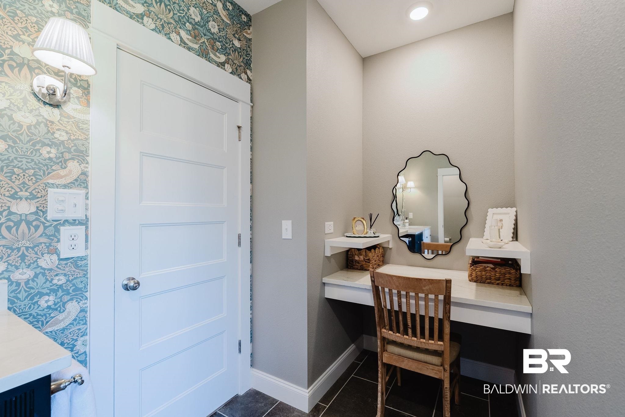 7872 Calverton Street Foley, AL 36535 - Photo 22 of 76 Built-in vanity area with floating shelves, a scalloped mirror, and recessed lighting