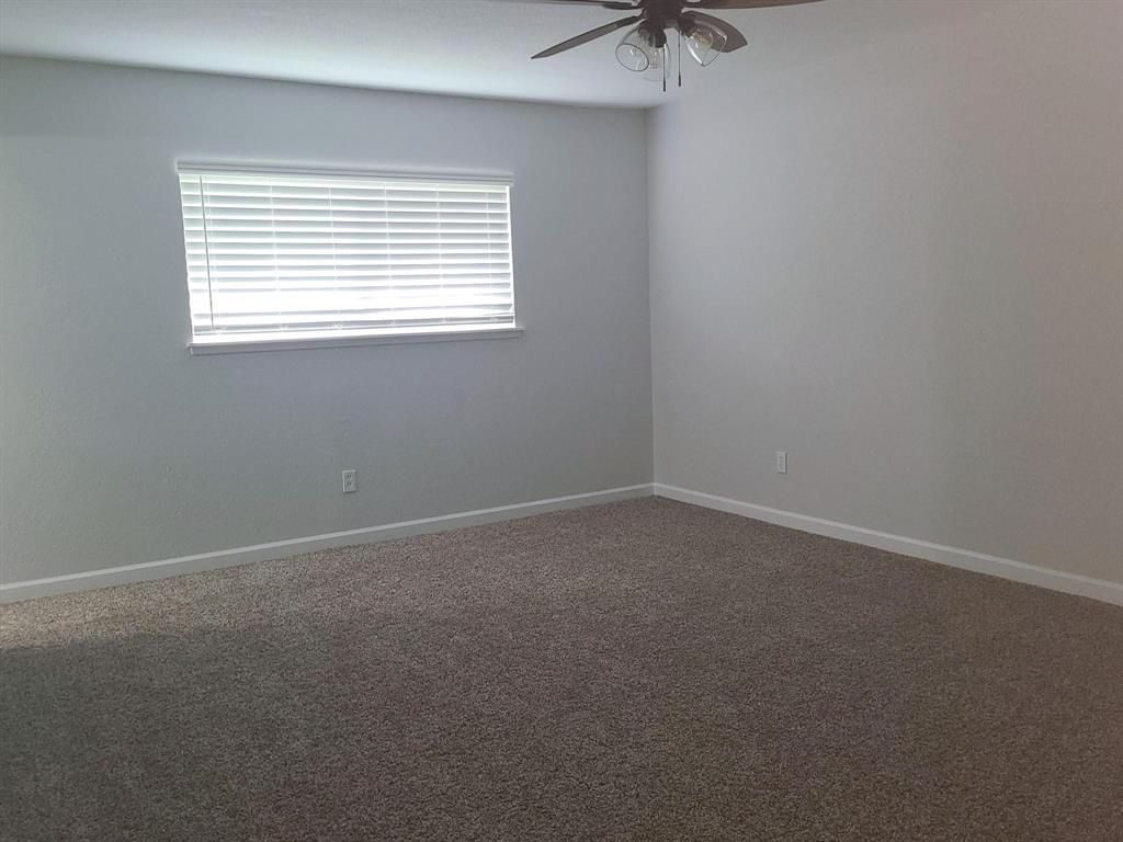 5036 Avery Lane The Colony, TX 75056 - Photo 13 of 22 an empty room with a window