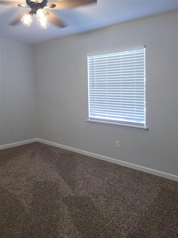 5036 Avery Lane The Colony, TX 75056 - Photo 16 of 22 an empty room with a window