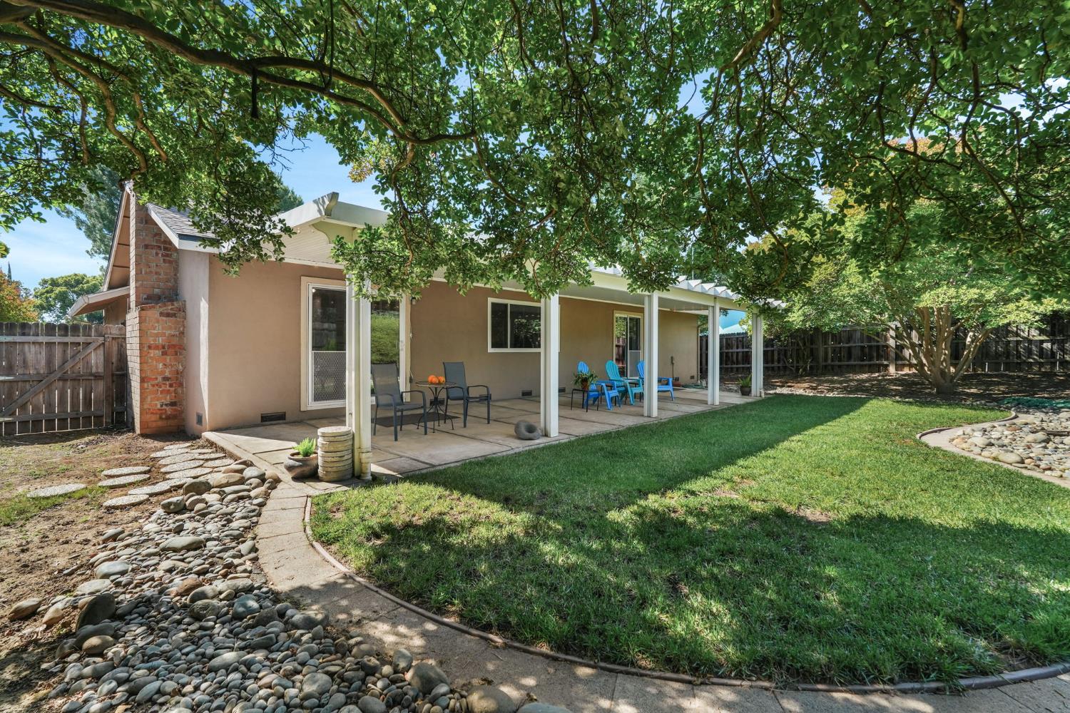 2276 El Cejo Circle Rancho Cordova, CA 95670 - Photo 30 of 41 The river is steps away for water recreation. But if you want to add a lap pool, there's room here!