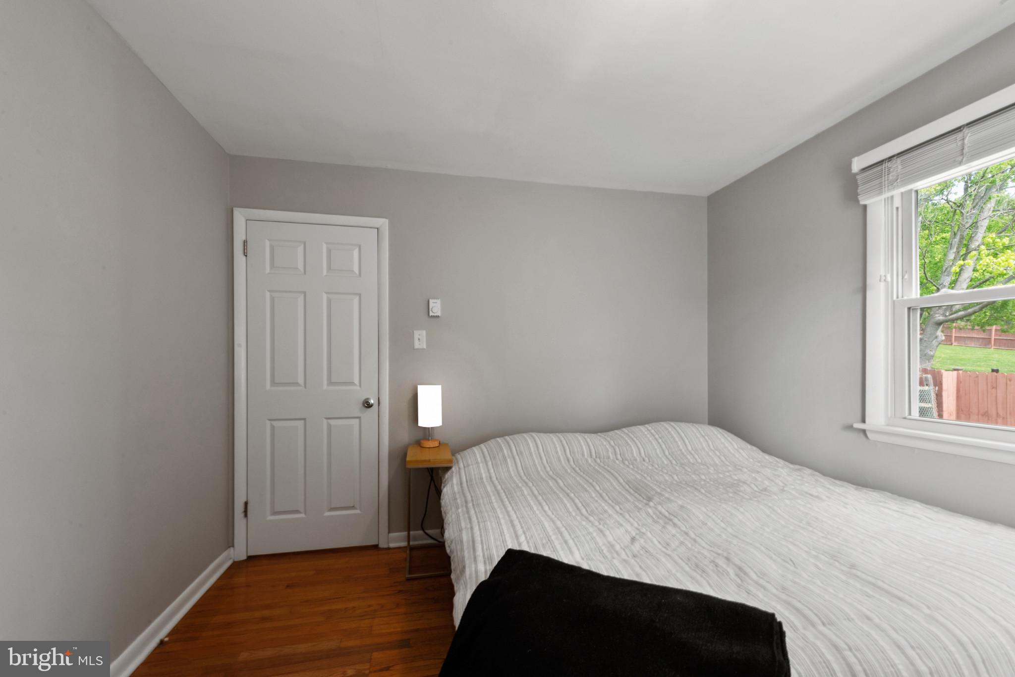 3242 Lineboro Road Manchester, MD 21102 - Photo 25 of 30 a bedroom with a bed and a window