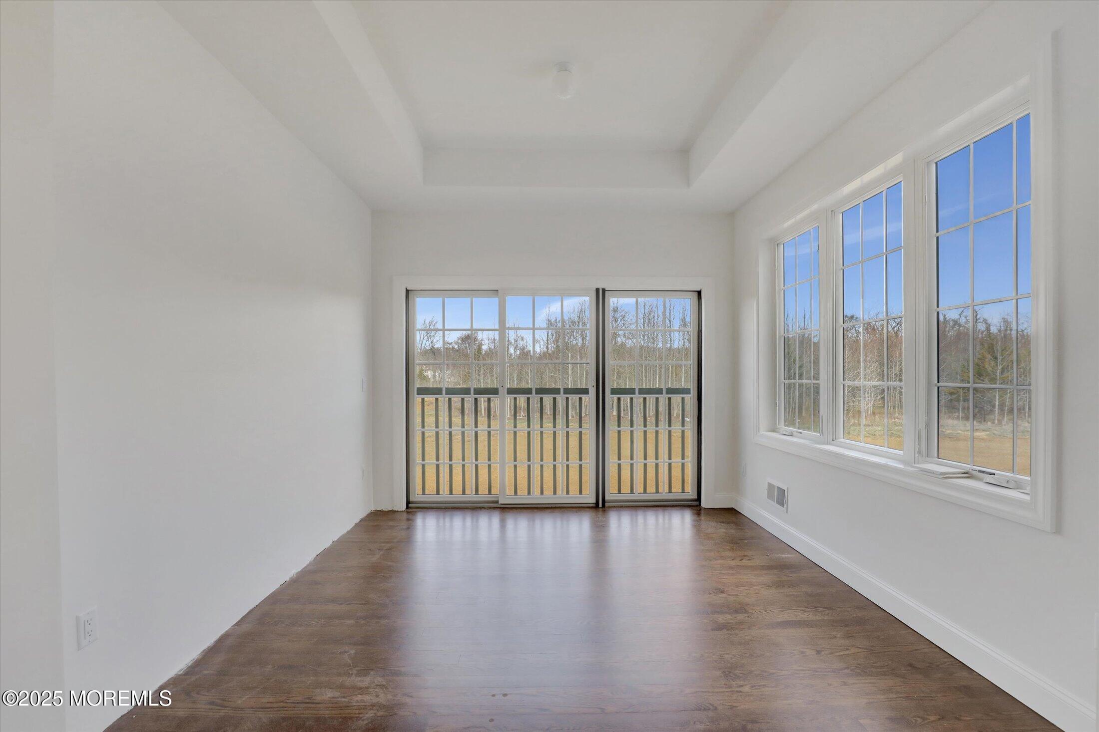 11 Cook Court Millstone Township, NJ 08535 - Photo 29 of 64 a view of wooden floor and windows in a room