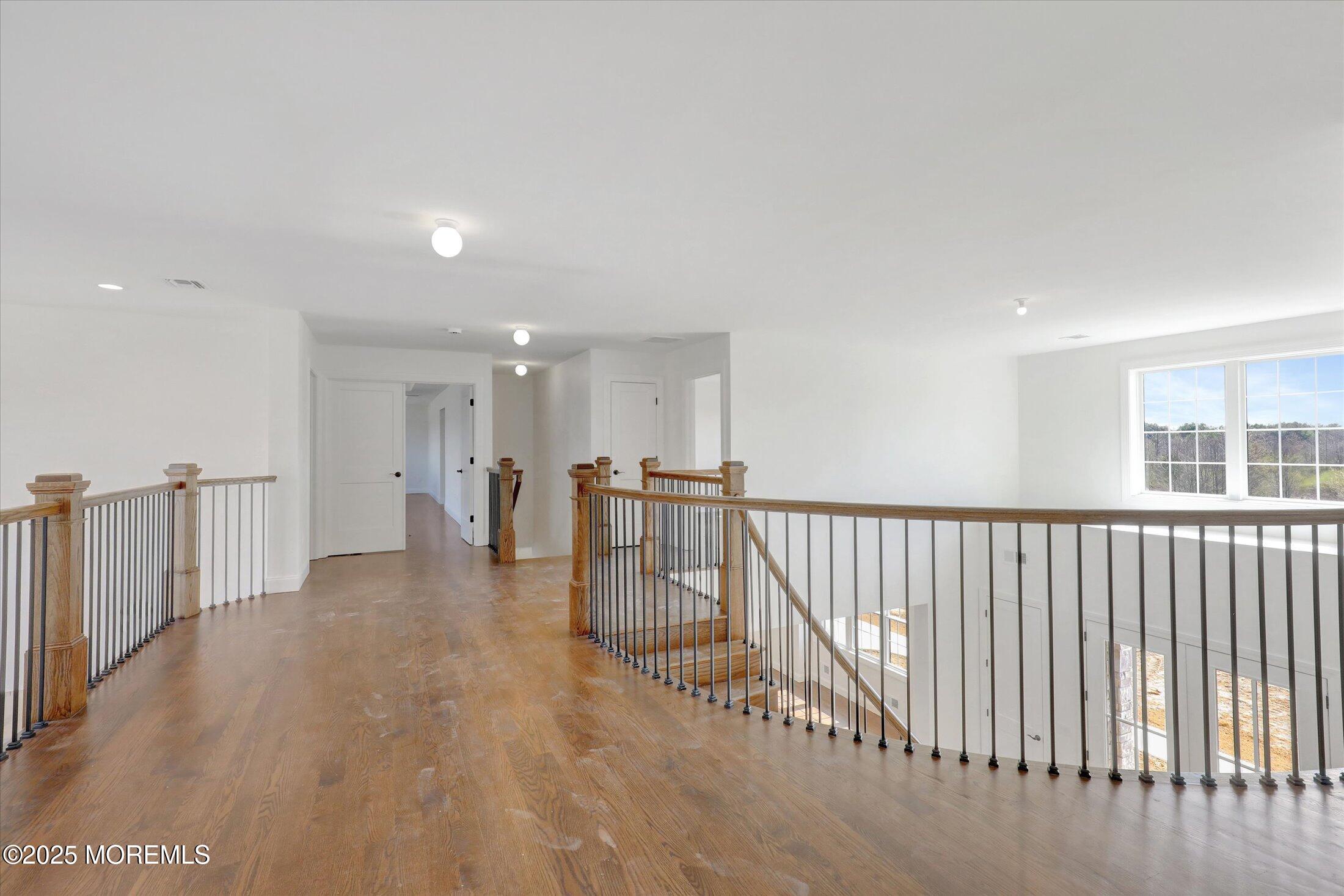 11 Cook Court Millstone Township, NJ 08535 - Photo 44 of 64 a view of a hallway with seating area