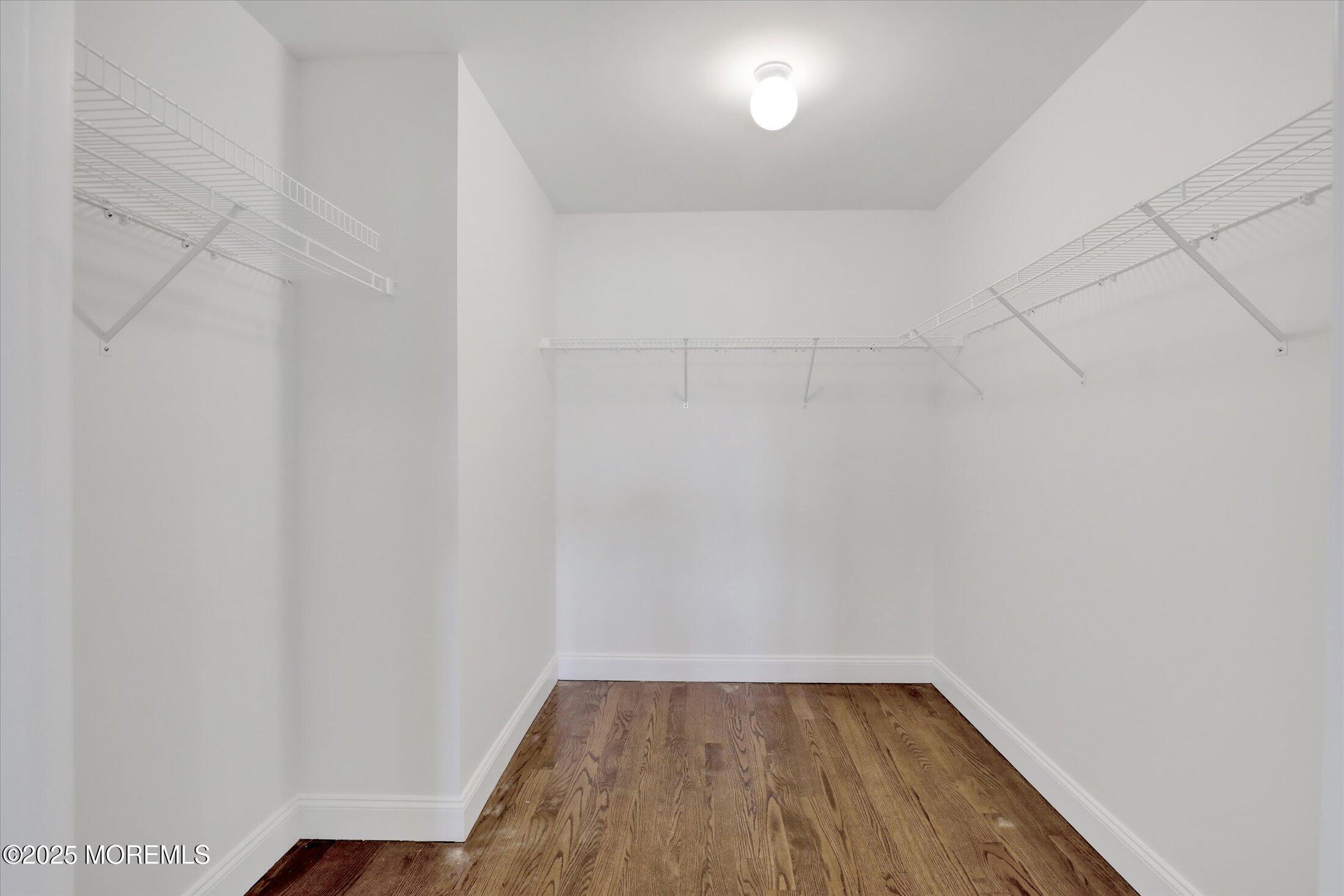 11 Cook Court Millstone Township, NJ 08535 - Photo 55 of 64 a view of a small space with wooden floor and a window