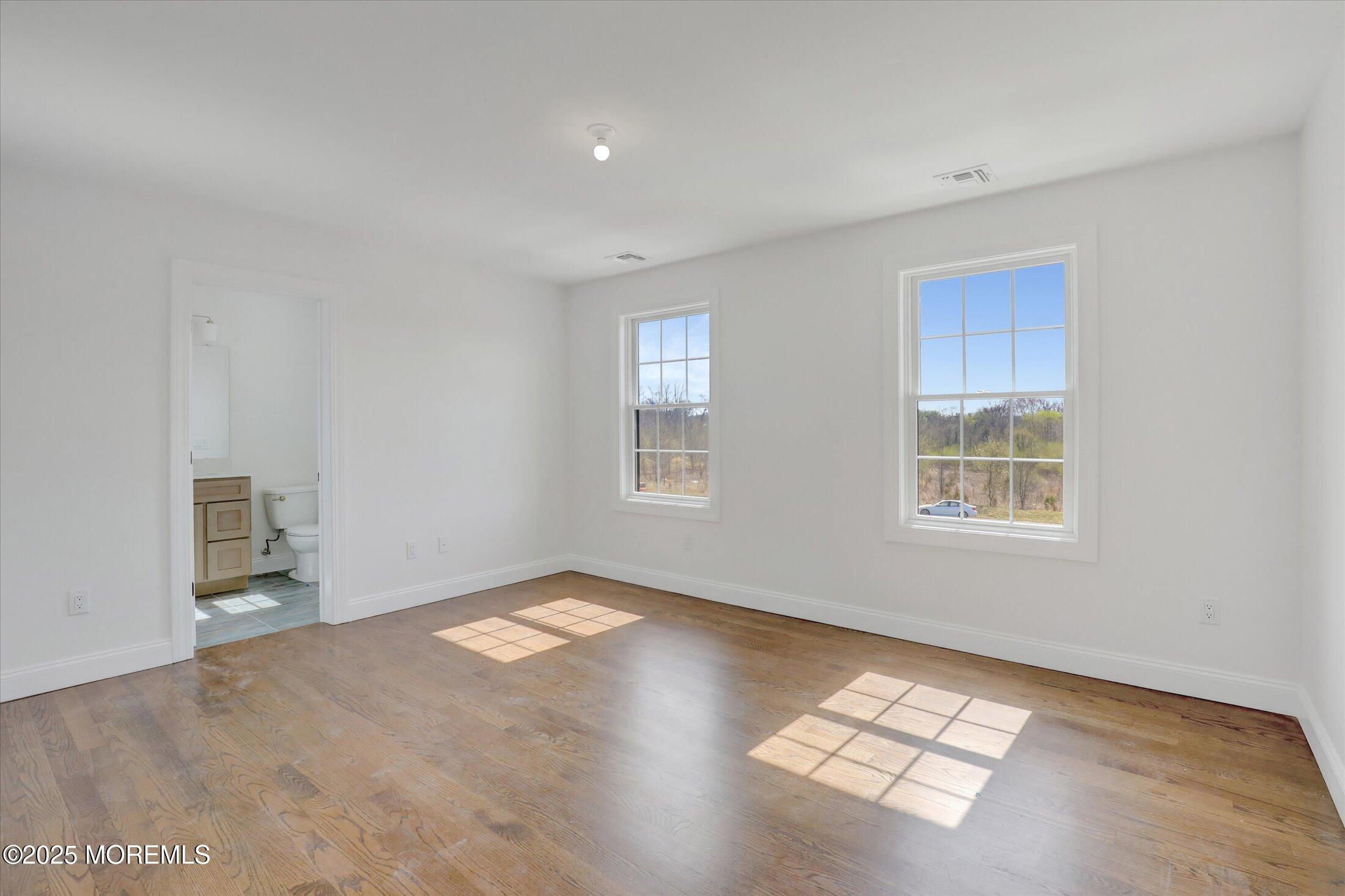 11 Cook Court Millstone Township, NJ 08535 - Photo 56 of 64 a view of an empty room with a window
