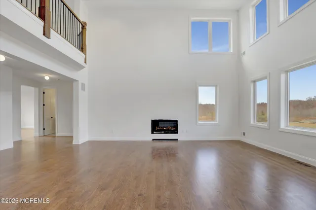 a view of a livingroom with wooden floor