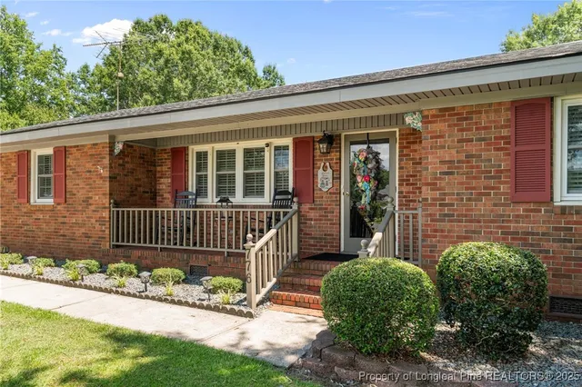 front view of a house with a small yard