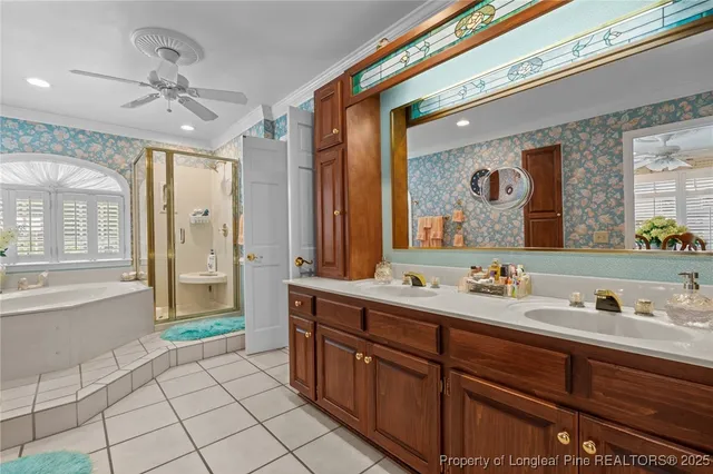 a spacious bathroom with a mirror a sink and bathtub