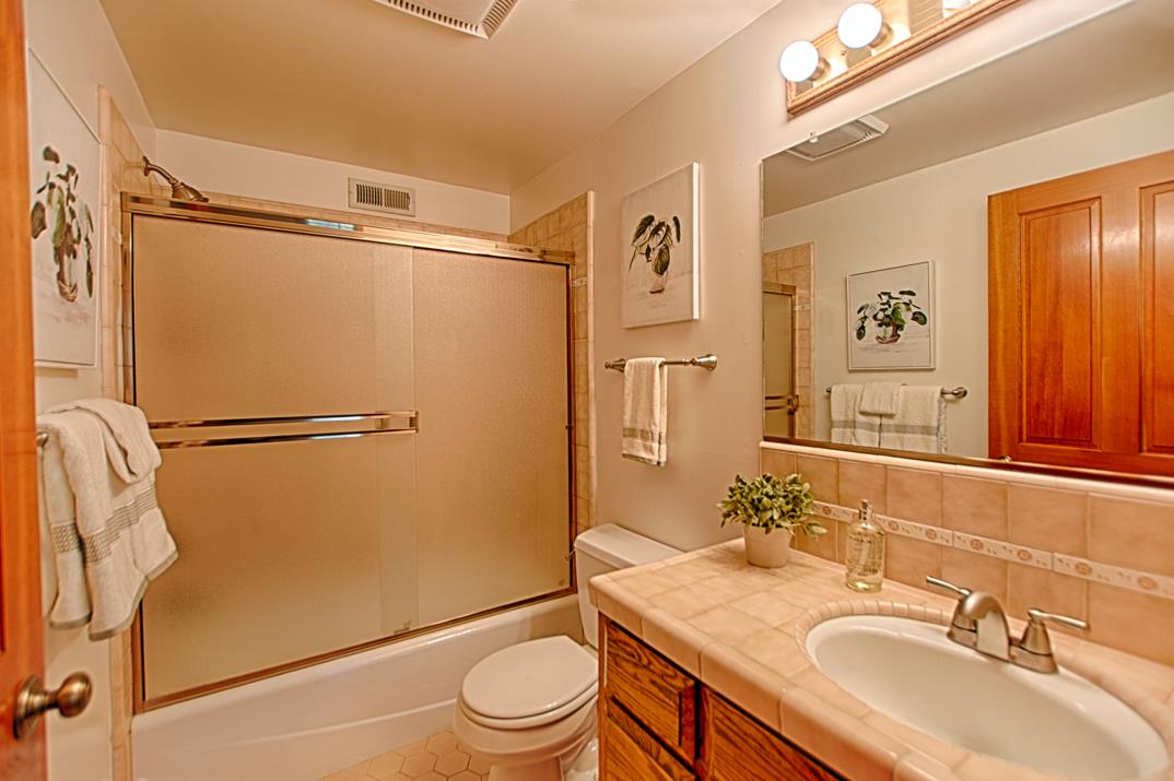 79 Pine Avenue Mount Hermon, CA 95041 - Photo 18 of 32 a bathroom with a sink toilet and shower