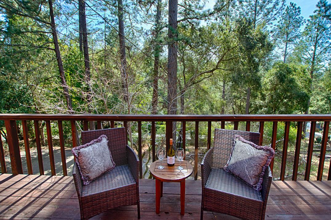 79 Pine Avenue Mount Hermon, CA 95041 - Photo 26 of 32 a balcony with chairs and a table