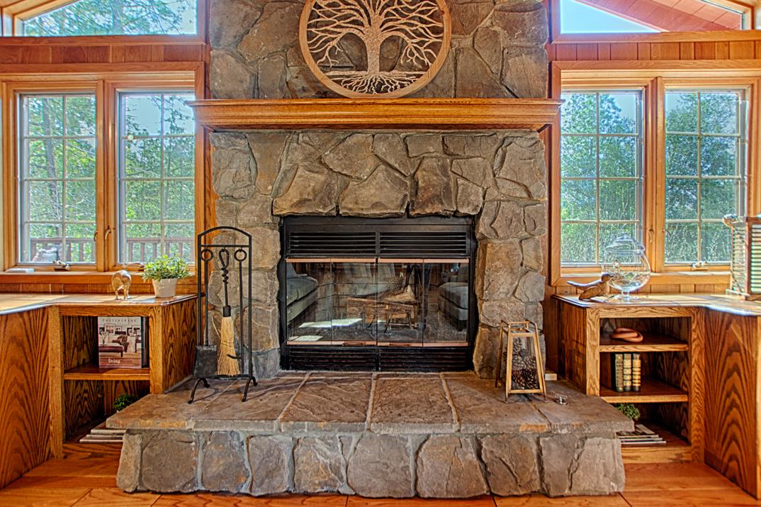 79 Pine Avenue Mount Hermon, CA 95041 - Photo 5 of 32 a bedroom with a bed and a fireplace