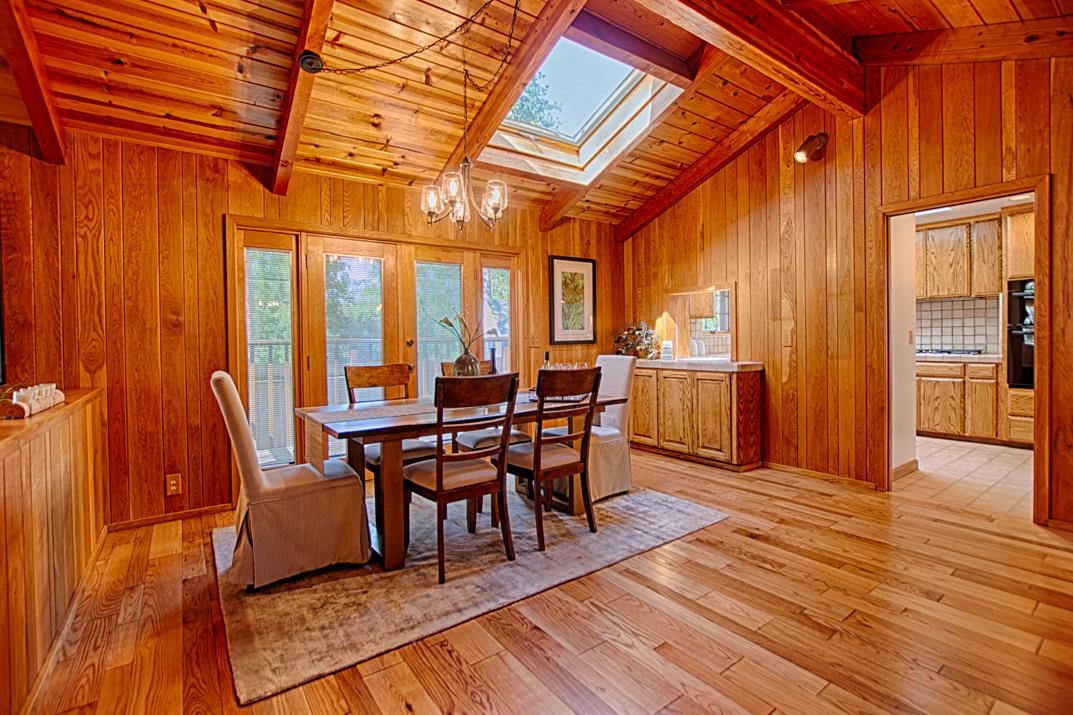 79 Pine Avenue Mount Hermon, CA 95041 - Photo 9 of 32 a view of a dining room with furniture and wooden floor