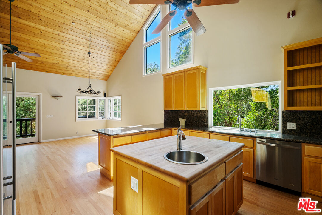 20912 Fontaine Road Topanga, CA 90290 - Photo 13 of 52 a kitchen with a sink and a stove