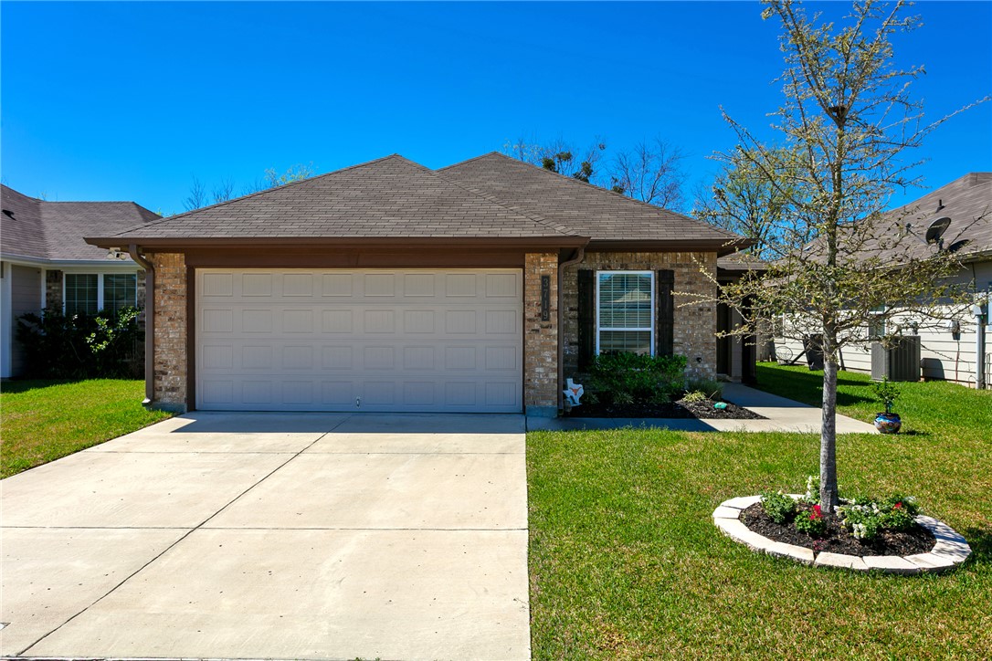3719 Mckenzie Street Bryan, TX 77803 - Photo 1 of 20 a front view of a house with a yard