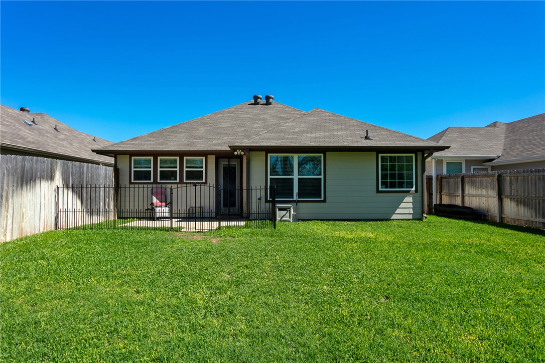 3719 Mckenzie Street Bryan, TX 77803 - Photo 19 of 20 a front view of a house with a garden