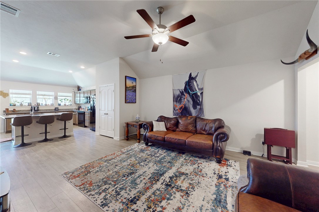 3719 Mckenzie Street Bryan, TX 77803 - Photo 4 of 20 a living room with furniture and a rug