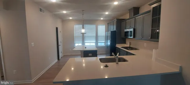 a view of a refrigerator in kitchen and a refrigerator