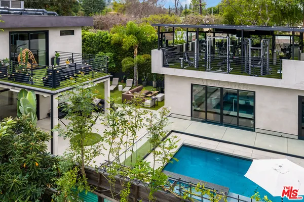 a house view with a garden space