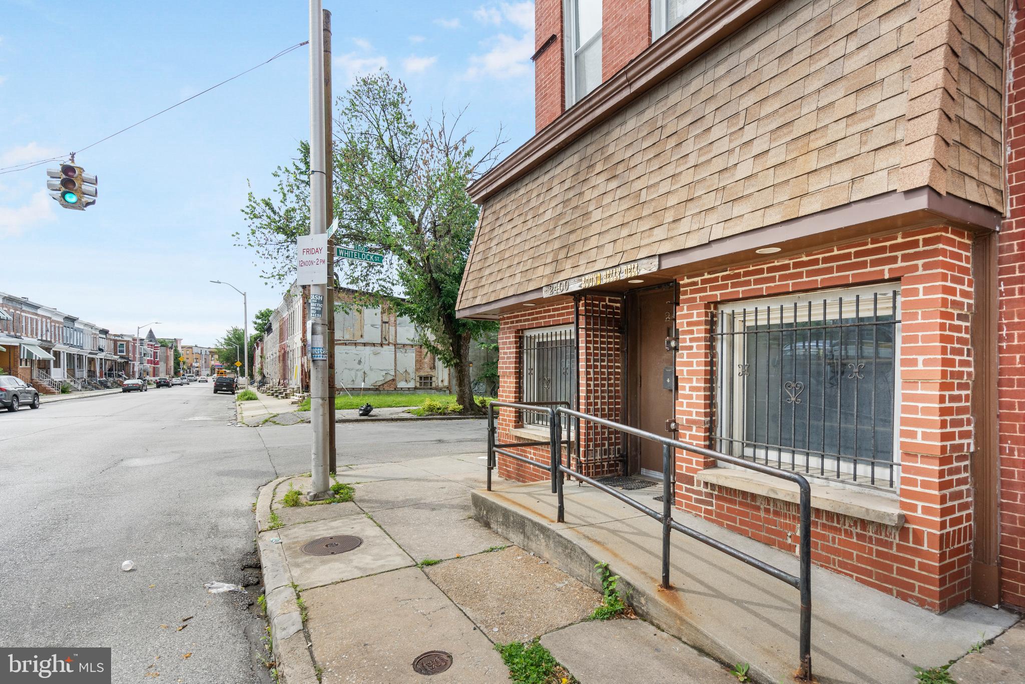2400 Druid Hill Avenue Baltimore, MD 21217 - Photo 20 of 27 a front view of a house with a porch