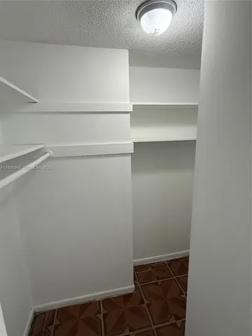 a view of balcony with furniture