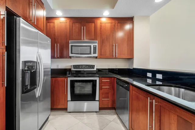 a bathroom with a sink a mirror and a bathtub